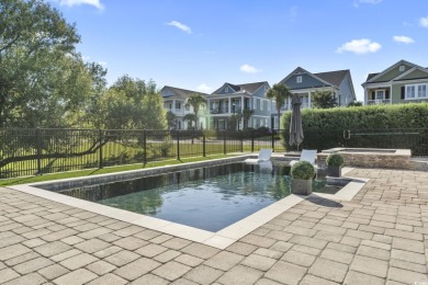 Nestled on a truly unique and expansive 69-foot-wide lot, this on Myrtlewood Golf Course and Club  in South Carolina - for sale on GolfHomes.com, golf home, golf lot