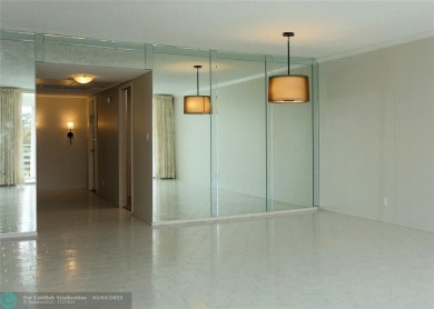 HUGE PRICE REDUCTION! This 5th-floor condo offers 1,500 square on Palm-Aire Country Club and Resort - The Oaks in Florida - for sale on GolfHomes.com, golf home, golf lot