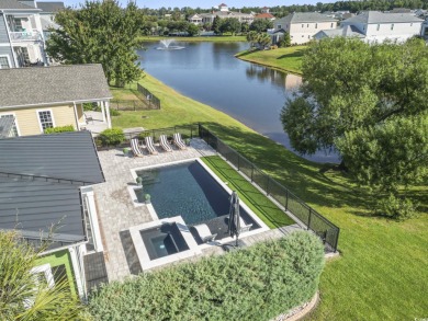 Nestled on a truly unique and expansive 69-foot-wide lot, this on Myrtlewood Golf Course and Club  in South Carolina - for sale on GolfHomes.com, golf home, golf lot