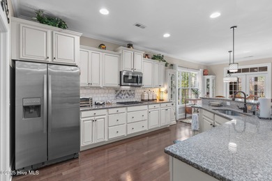 Stunning home on an oversized lot in the highly desirable on Compass Pointe Golf Course in North Carolina - for sale on GolfHomes.com, golf home, golf lot