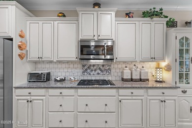 Stunning home on an oversized lot in the highly desirable on Compass Pointe Golf Course in North Carolina - for sale on GolfHomes.com, golf home, golf lot