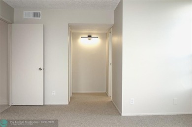 HUGE PRICE REDUCTION! This 5th-floor condo offers 1,500 square on Palm-Aire Country Club and Resort - The Oaks in Florida - for sale on GolfHomes.com, golf home, golf lot