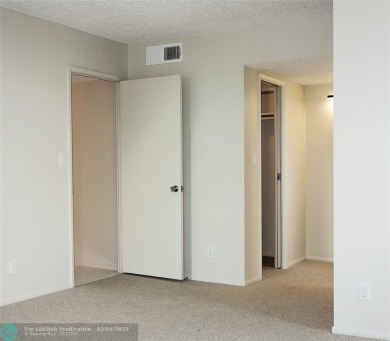 HUGE PRICE REDUCTION! This 5th-floor condo offers 1,500 square on Palm-Aire Country Club and Resort - The Oaks in Florida - for sale on GolfHomes.com, golf home, golf lot