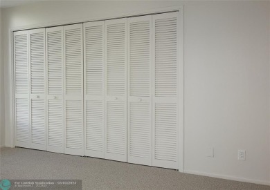 HUGE PRICE REDUCTION! This 5th-floor condo offers 1,500 square on Palm-Aire Country Club and Resort - The Oaks in Florida - for sale on GolfHomes.com, golf home, golf lot