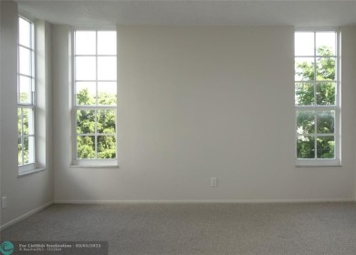 HUGE PRICE REDUCTION! This 5th-floor condo offers 1,500 square on Palm-Aire Country Club and Resort - The Oaks in Florida - for sale on GolfHomes.com, golf home, golf lot