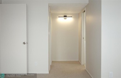 HUGE PRICE REDUCTION! This 5th-floor condo offers 1,500 square on Palm-Aire Country Club and Resort - The Oaks in Florida - for sale on GolfHomes.com, golf home, golf lot