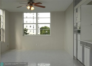 HUGE PRICE REDUCTION! This 5th-floor condo offers 1,500 square on Palm-Aire Country Club and Resort - The Oaks in Florida - for sale on GolfHomes.com, golf home, golf lot