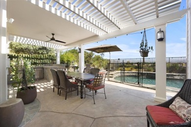 Discover this luxurious executive pool home in prestigious on TPC At Valencia in California - for sale on GolfHomes.com, golf home, golf lot