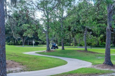 Exceptional home located on the 14th green of the Fazio designed on Hunters Green Country Club in Florida - for sale on GolfHomes.com, golf home, golf lot