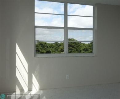 HUGE PRICE REDUCTION! This 5th-floor condo offers 1,500 square on Palm-Aire Country Club and Resort - The Oaks in Florida - for sale on GolfHomes.com, golf home, golf lot