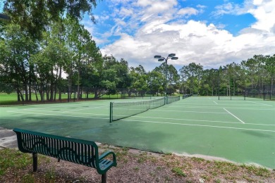 Exceptional home located on the 14th green of the Fazio designed on Hunters Green Country Club in Florida - for sale on GolfHomes.com, golf home, golf lot