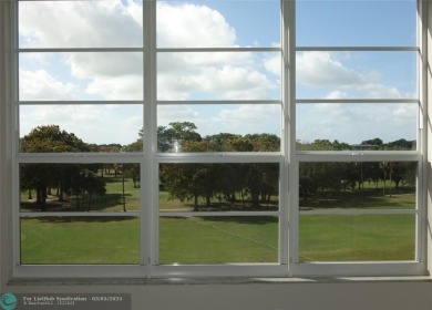 HUGE PRICE REDUCTION! This 5th-floor condo offers 1,500 square on Palm-Aire Country Club and Resort - The Oaks in Florida - for sale on GolfHomes.com, golf home, golf lot