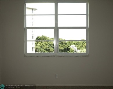HUGE PRICE REDUCTION! This 5th-floor condo offers 1,500 square on Palm-Aire Country Club and Resort - The Oaks in Florida - for sale on GolfHomes.com, golf home, golf lot