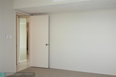 HUGE PRICE REDUCTION! This 5th-floor condo offers 1,500 square on Palm-Aire Country Club and Resort - The Oaks in Florida - for sale on GolfHomes.com, golf home, golf lot