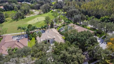 Exceptional home located on the 14th green of the Fazio designed on Hunters Green Country Club in Florida - for sale on GolfHomes.com, golf home, golf lot