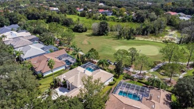 Exceptional home located on the 14th green of the Fazio designed on Hunters Green Country Club in Florida - for sale on GolfHomes.com, golf home, golf lot