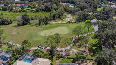 Exceptional home located on the 14th green of the Fazio designed on Hunters Green Country Club in Florida - for sale on GolfHomes.com, golf home, golf lot