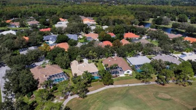 Exceptional home located on the 14th green of the Fazio designed on Hunters Green Country Club in Florida - for sale on GolfHomes.com, golf home, golf lot