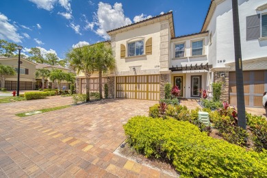 Welcome home to Binks Pointe, a gated enclave of stylish on Binks Forest Golf Club in Florida - for sale on GolfHomes.com, golf home, golf lot