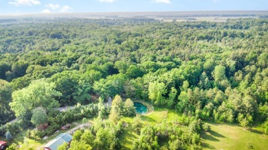 $20,000 price drop & Owner says make an offer! Private Northern on Pine River Golf Club in Michigan - for sale on GolfHomes.com, golf home, golf lot