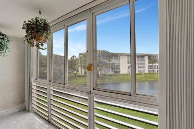 JUST PAINTED & WALLPAPER REMOVED! SALE OF THE CENTURY IN VIBRANT on Wynmoor Golf Course in Florida - for sale on GolfHomes.com, golf home, golf lot