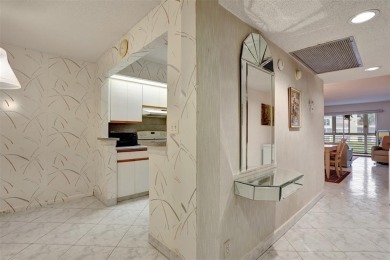 JUST PAINTED & WALLPAPER REMOVED! SALE OF THE CENTURY IN VIBRANT on Wynmoor Golf Course in Florida - for sale on GolfHomes.com, golf home, golf lot