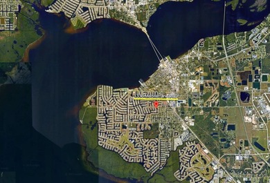 Don't miss this powerboat-access waterfront lot in the highly on Saint Andrews South Golf Club in Florida - for sale on GolfHomes.com, golf home, golf lot