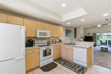 Welcome to this charming and well-maintained 2-bedroom, 2-bath on Deep Creek Golf Club in Florida - for sale on GolfHomes.com, golf home, golf lot