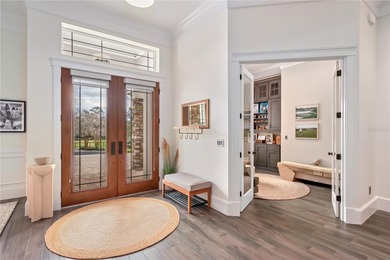 Come and enjoy this stunning custom residence in one of Central on Golden Ocala Golf and Equestrian Club in Florida - for sale on GolfHomes.com, golf home, golf lot