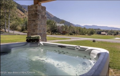 Discover elevated mountain living in this stunning 6-bedroom on Star Valley RV Golf Course in Wyoming - for sale on GolfHomes.com, golf home, golf lot