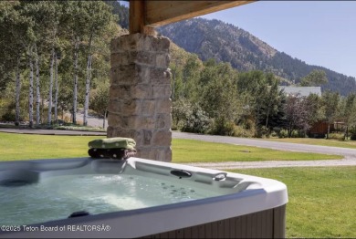 Discover elevated mountain living in this stunning 6-bedroom on Star Valley RV Golf Course in Wyoming - for sale on GolfHomes.com, golf home, golf lot