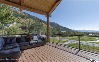 Discover elevated mountain living in this stunning 6-bedroom on Star Valley RV Golf Course in Wyoming - for sale on GolfHomes.com, golf home, golf lot