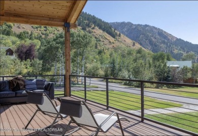 Discover elevated mountain living in this stunning 6-bedroom on Star Valley RV Golf Course in Wyoming - for sale on GolfHomes.com, golf home, golf lot