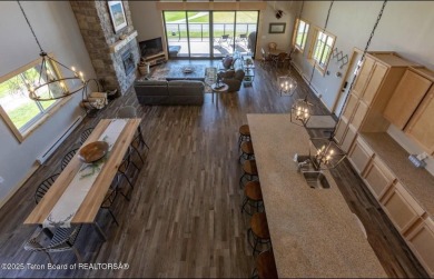 Discover elevated mountain living in this stunning 6-bedroom on Star Valley RV Golf Course in Wyoming - for sale on GolfHomes.com, golf home, golf lot