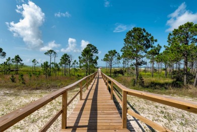 Fall in love with this lot in beautiful DeSoto Landing, the on Isle Dauphine Club Golf Course in Alabama - for sale on GolfHomes.com, golf home, golf lot