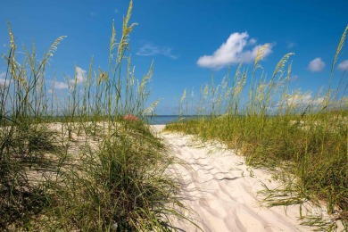 Fall in love with this lot in beautiful DeSoto Landing, the on Isle Dauphine Club Golf Course in Alabama - for sale on GolfHomes.com, golf home, golf lot