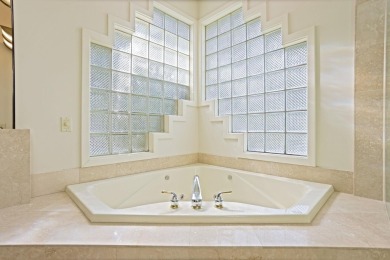 This all brick home, has everything you will need for easy on The Sawmill Golf Club in Michigan - for sale on GolfHomes.com, golf home, golf lot
