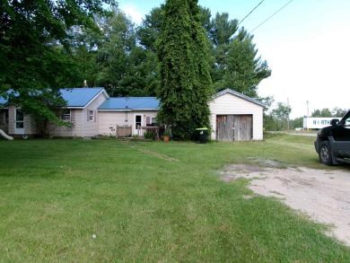 3 BD Home in Village of Farwell within walking distance of on Eagle Glen Golf Course in Michigan - for sale on GolfHomes.com, golf home, golf lot