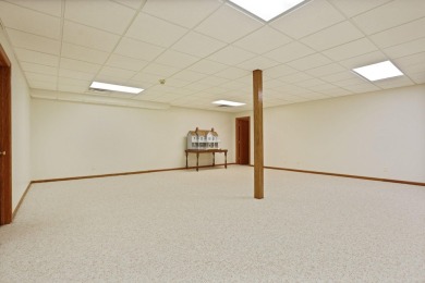 This all brick home, has everything you will need for easy on The Sawmill Golf Club in Michigan - for sale on GolfHomes.com, golf home, golf lot