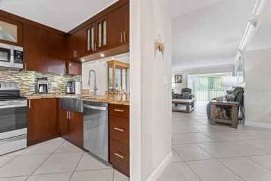 This beautiful condo offers a perfect blend of comfort and on Forest Oaks Golf Club in Florida - for sale on GolfHomes.com, golf home, golf lot