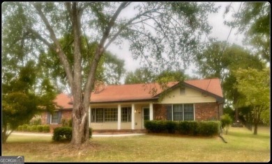 Must see gem. Welcome to this well maintained beautiful 3/2 bath on Honey Creek Country Club in Georgia - for sale on GolfHomes.com, golf home, golf lot