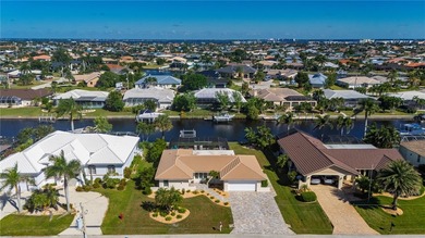 Every inch of this Punta Gorda Isles waterfront residence on Saint Andrews South Golf Club in Florida - for sale on GolfHomes.com, golf home, golf lot