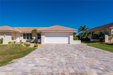 Every inch of this Punta Gorda Isles waterfront residence on Saint Andrews South Golf Club in Florida - for sale on GolfHomes.com, golf home, golf lot