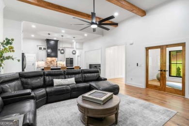 nWelcome to this stunning Craftsman home nestled on a beautiful on The Club River Forest in Georgia - for sale on GolfHomes.com, golf home, golf lot