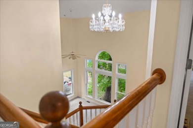 Welcome home! This classic brick-front Southern charmer in the on Country Club of Gwinnett in Georgia - for sale on GolfHomes.com, golf home, golf lot