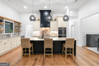 nWelcome to this stunning Craftsman home nestled on a beautiful on The Club River Forest in Georgia - for sale on GolfHomes.com, golf home, golf lot