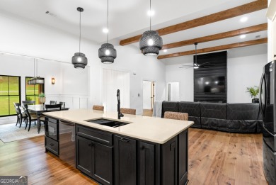nWelcome to this stunning Craftsman home nestled on a beautiful on The Club River Forest in Georgia - for sale on GolfHomes.com, golf home, golf lot