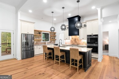 nWelcome to this stunning Craftsman home nestled on a beautiful on The Club River Forest in Georgia - for sale on GolfHomes.com, golf home, golf lot