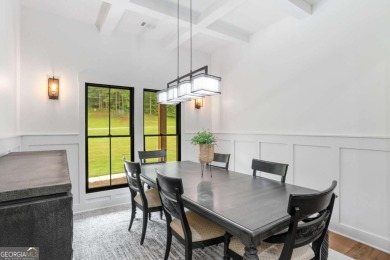 nWelcome to this stunning Craftsman home nestled on a beautiful on The Club River Forest in Georgia - for sale on GolfHomes.com, golf home, golf lot