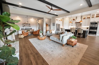 Located in the prestigious Heath Golf & Yacht Club, this on Heath Golf and Yacht Club in Texas - for sale on GolfHomes.com, golf home, golf lot